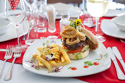Chef-prepared burger and fresh salad at Summervale